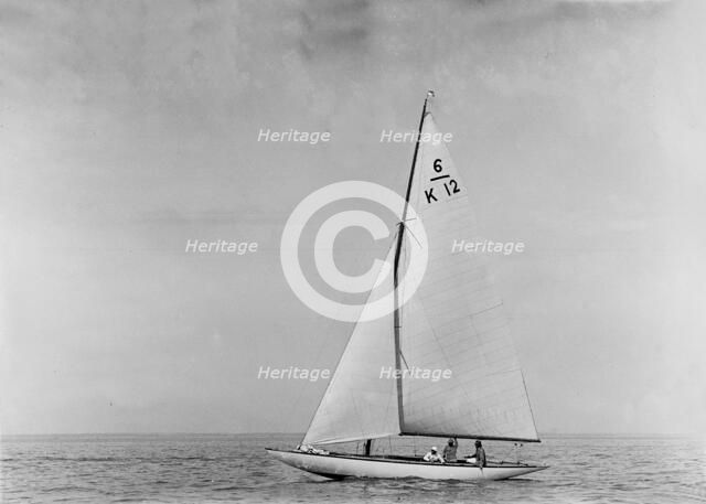 The 6 Metre sailing yacht 'Caryl' (K12), 1921. Creator: Kirk & Sons of Cowes.