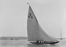 The 6 Metre sailing yacht Margaret (K14) sailing upwind, 1921. Creator: Kirk & Sons of Cowes