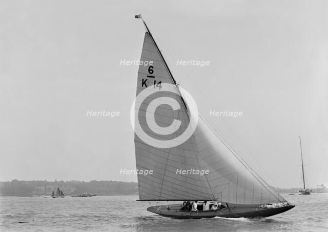 The 6 Metre sailing yacht 'Margaret' (K14) sailing upwind, 1921. Creator: Kirk & Sons of Cowes.