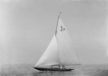 The 6 Metre sailing yacht Margaret (K14) sailing close-hauled, 1921. Creator: Kirk & Sons of Cowes