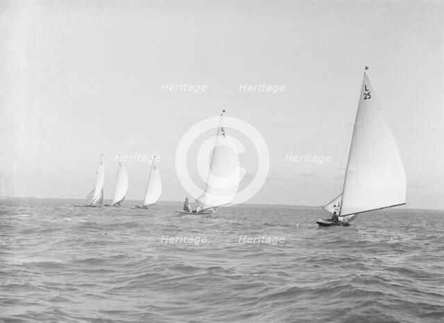 The 6 Metre 'Stella', ' Vanda ', 'Bubble', 'Wamba' and 'Lanka' racing downwind, 1914. Creator: Kirk & Sons of Cowes.