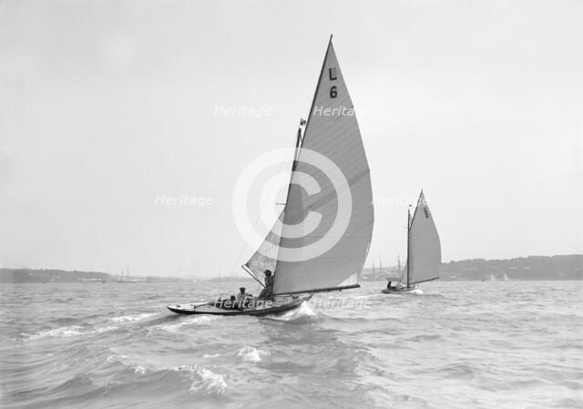 The 6 Metre 'The Whim' (L6) and 'Correnzia' racing downwind, 1911. Creator: Kirk & Sons of Cowes.