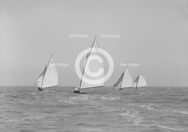 The 6 Metres boats 'Snowdrop', 'The Whim', 'Cheetal' and 'Ejnar' racing downwind. Creator: Kirk & Sons of Cowes.