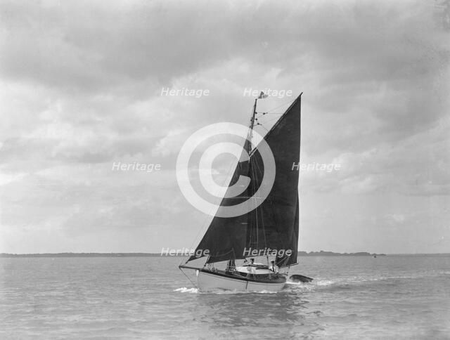 The 6 ton ketch 'Shona' under sail, 1921. Creator: Kirk & Sons of Cowes.