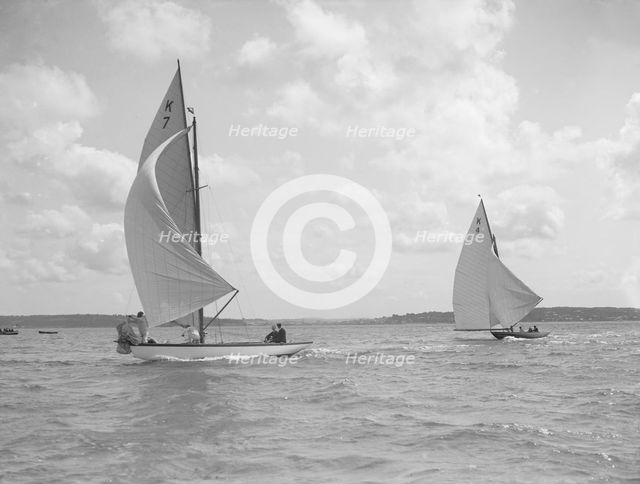 The 7 Metre class 'Anitra' (K4) and 'Ginevra' (K7) race downwind, 1912. Creator: Kirk & Sons of Cowes.