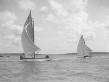The 7 Metre class Anitra (K4) and Ginevra (K7) race downwind, 1912. Creator: Kirk & Sons of Cowes