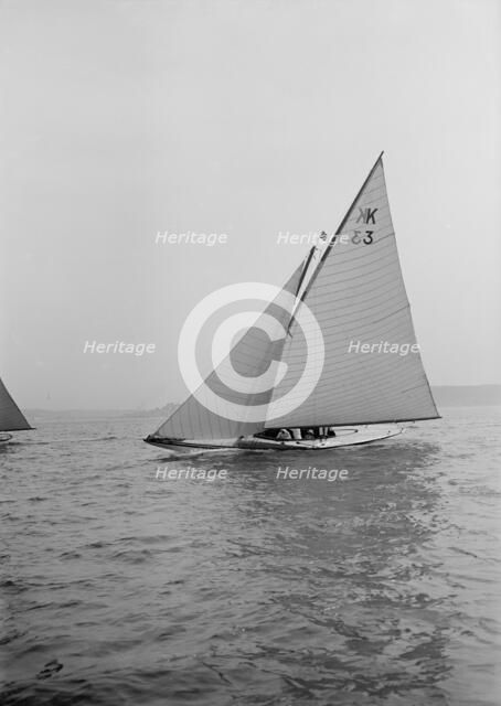 The 7 Metre 'Ancora' (K3) sailing close-hauled, 1913. Creator: Kirk & Sons of Cowes.