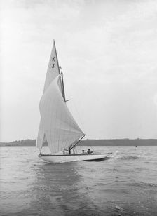 The 7 Metre Ancora (K3) sailing under spinnaker, 1913. Creator: Kirk & Sons of Cowes