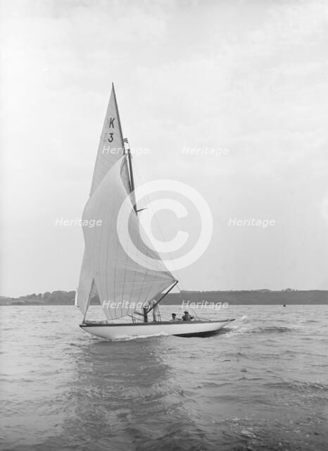 The 7 Metre 'Ancora' (K3) sailing under spinnaker, 1913. Creator: Kirk & Sons of Cowes.