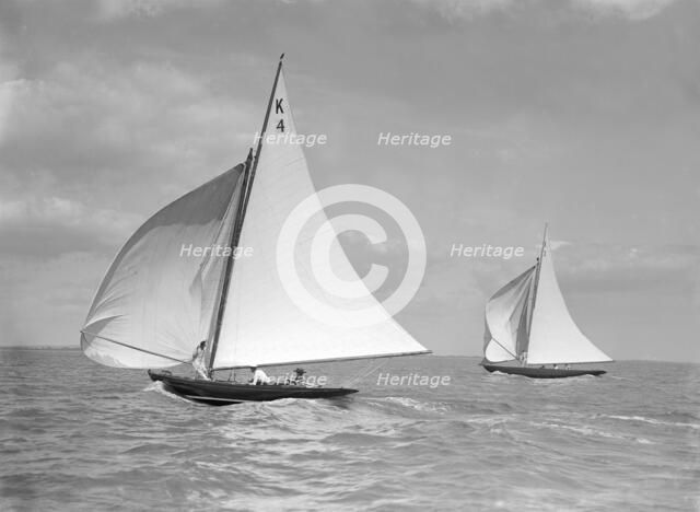 The 7 Metre 'Anitra' (foreground) and 'Nelta', on downwind leg, 1911. Creator: Kirk & Sons of Cowes.