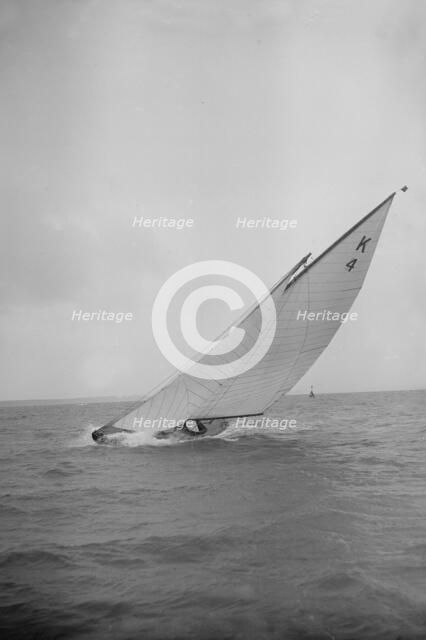 The 7 Metre 'Anitra' (K4) heeling in strong wind, 1912. Creator: Kirk & Sons of Cowes.