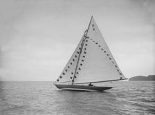 The 7 Metre sailing yacht Pinaster (K8) with prize flags, 1912. Creator: Kirk & Sons of Cowes