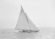 The 7 Metre yacht Ithnan (K2) sailing close-hauled, 1911. Creator: Kirk & Sons of Cowes