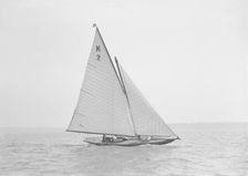 The 7 Metre yacht Ithnan (K2) sailing close-hauled, 1911. Creator: Kirk & Sons of Cowes