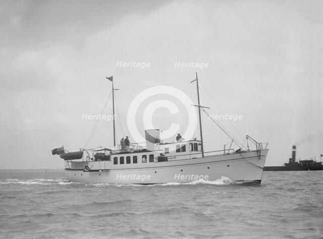 The 71 ton motor yacht 'Romana' under way, 1936. Creator: Kirk & Sons of Cowes.