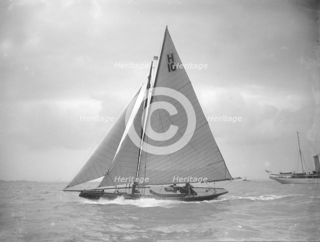 The 8 Metre class 'Kathleen' (H10) sailing upwind in a good breeze, 1911. Creator: Kirk & Sons of Cowes.