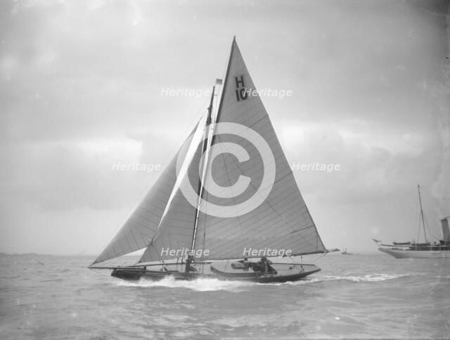 The 8 Metre class 'Kathleen' (H10) sailing upwind in a good breeze, 1911. Creator: Kirk & Sons of Cowes.