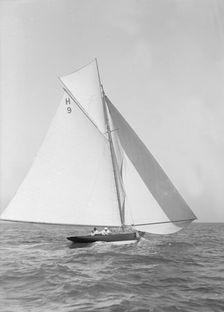 The 8 Metre class Termagent (H9) sailing with spinnaker, 1911. Creator: Kirk & Sons of Cowes