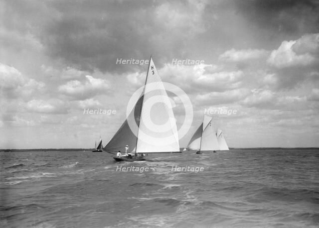The 8 Metre class 'Verbena'. 'Termagent' and 'Windflower' race downwind, 1911. Creator: Kirk & Sons of Cowes.