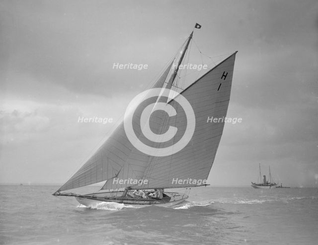 The 8 Metre class yacht 'Norman' (H1) sailing close-hauled, 1911. Creator: Kirk & Sons of Cowes.