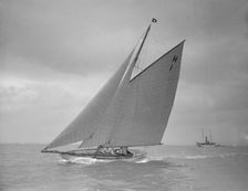 The 8 Metre class yacht Norman (H1) sailing close-hauled, 1911. Creator: Kirk & Sons of Cowes