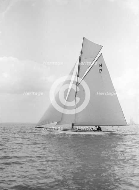 The 8 Metre 'Ierne' sailing close-hauled, 1913. Creator: Kirk & Sons of Cowes.