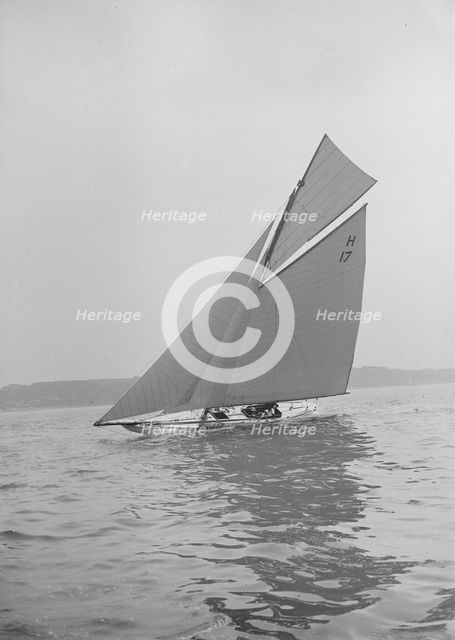 The 8 Metre 'Ierne' sailing close-hauled, 1913. Creator: Kirk & Sons of Cowes.