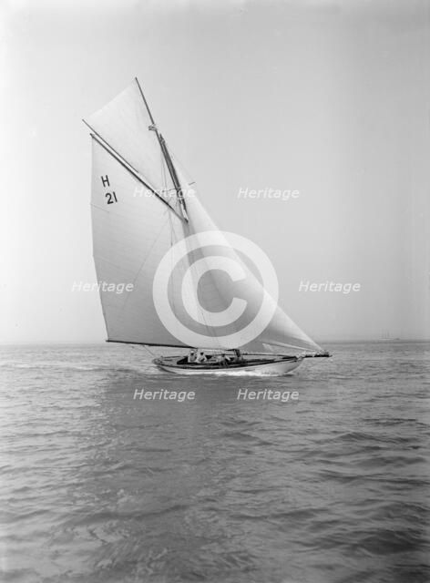 The 8 Metre 'Le Jade' (H21) sailing in fine conditions, 1912. Creator: Kirk & Sons of Cowes.