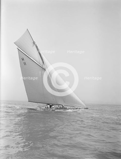 The 8 Metre 'Ventana' (H11) sailing close-hauled, 1912. Creator: Kirk & Sons of Cowes.
