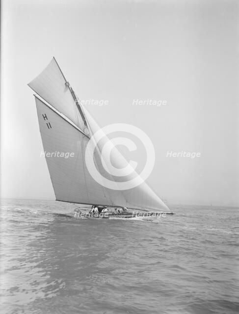 The 8 Metre 'Ventana' (H11) sailing close-hauled, 1912. Creator: Kirk & Sons of Cowes.