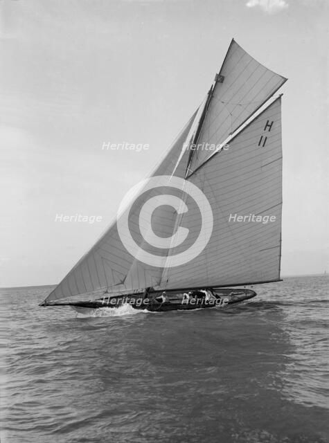 The 8 Metre 'Ventana' (H11) sailing close-hauled, 1914. Creator: Kirk & Sons of Cowes.