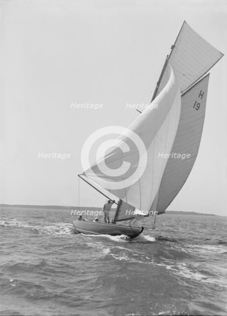 The 8 Metre yacht 'Antwerpia' (H19) sailing with spinnaker, 1911. Creator: Kirk & Sons of Cowes.