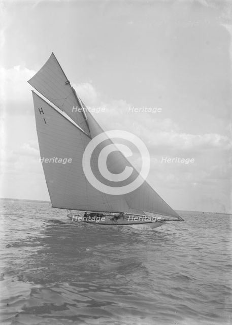 The 8 Metre yacht 'Norman' (H1) sailing close-hauled, 1911. Creator: Kirk & Sons of Cowes.