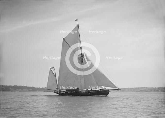 The 95 ft yawl 'Artemis' sailing close-hauled, 1911. Creator: Kirk & Sons of Cowes.