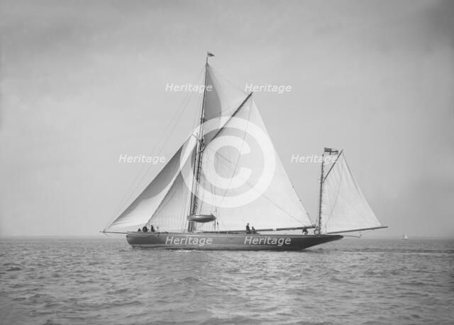 The 95 ft yawl 'Artemis' sailing close-hauled, 1911. Creator: Kirk & Sons of Cowes.