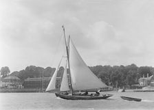 The 9 ton auxilary cutter Grayling with tender, 1921. Creator: Kirk & Sons of Cowes