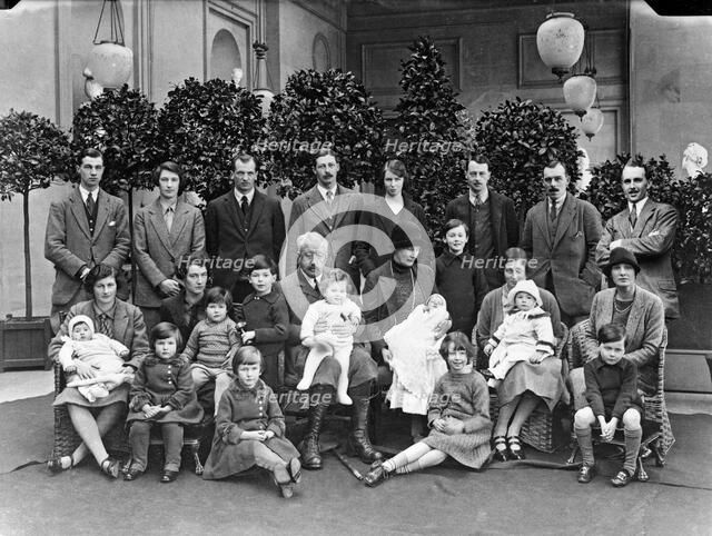 The 9th Duke of Devonshire with his children and grandchildren at Chatsworth, Christmas 1925. Artist: JR Board