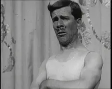 The Music Hall Star Billy Merson Pulling a Variety of Funny Faces, 1920s. Creator: British Pathe Ltd