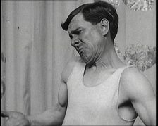 The Music Hall Star Billy Merson Pulling a Variety of Funny Faces, 1920s. Creator: British Pathe Ltd