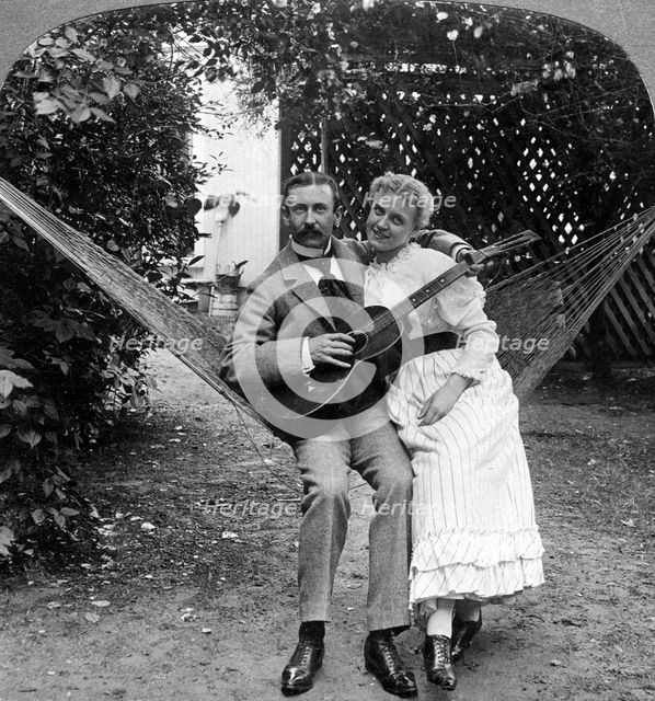 'The Musical Pair in the Hammock'.Artist: American Stereoscopic Company