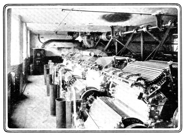 The machines, driven by electricity, that make the fibres of the cotton parallel..., 1909.  Creator: Unknown.