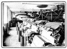 The machines, driven by electricity, that make the fibres of the cotton parallel..., 1909. Creator: Unknown