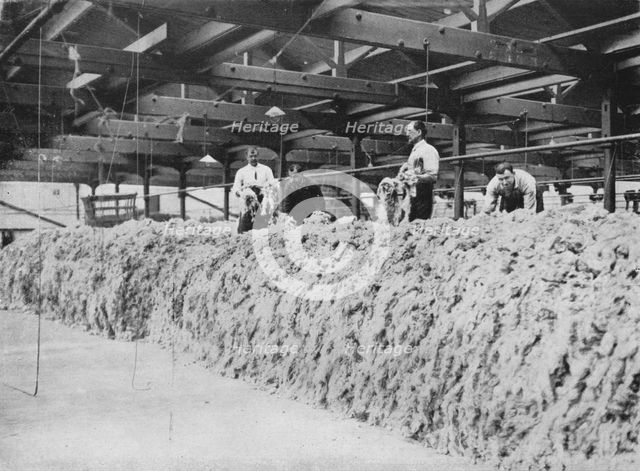 'The making of khaki - Wool blending', 1915. Artist: Unknown.