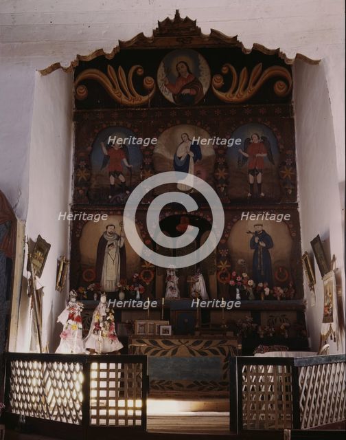 The main altar in the church, Trampas, N.M. , 1943. Creator: John Collier.