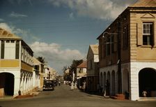 The main shopping street, Christiansted, Saint Croix, Virgin Islands, 1941. Creator: Jack Delano
