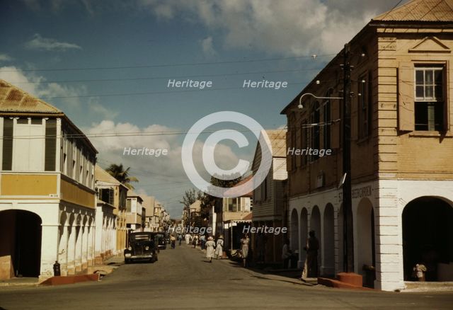 The main shopping street, Christiansted, Saint Croix, Virgin Islands, 1941. Creator: Jack Delano.
