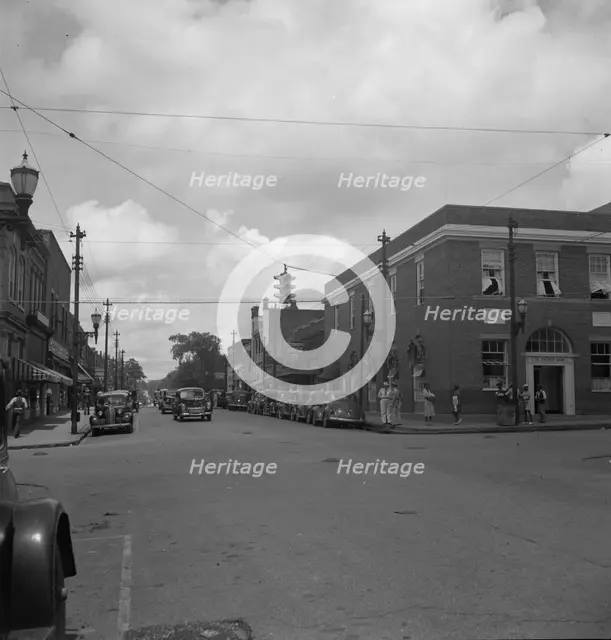 The main street, Fayetteville Street, of Siler City, North Carolina, 1939. Creator: Dorothea Lange.