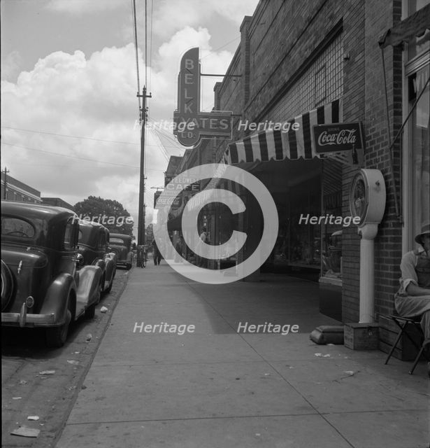The main street, Fayetteville Street, of Siler City, North Carolina, 1939. Creator: Dorothea Lange.