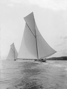 The majestic cutters White Heather and Shamrock race downwind, 1912. Creator: Kirk & Sons of Cowes