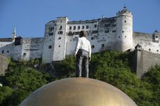 The Man on top of The Golden Ball of the Sphaera, Festung Hohensalzburg, Salzburg, Austria, 2022. Creator: Ethel Davies